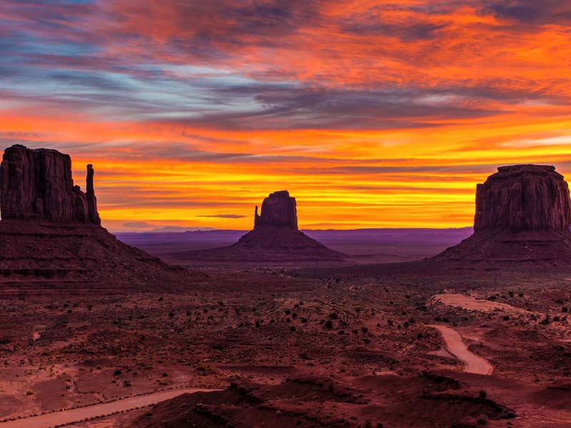 The Mittens Buttes and Merrick Butte in the Monument Valley, photographed at sunset