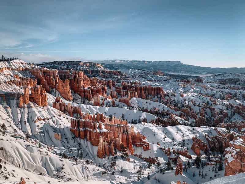 An aerial view of Bryce Canyon National Park covered by snow