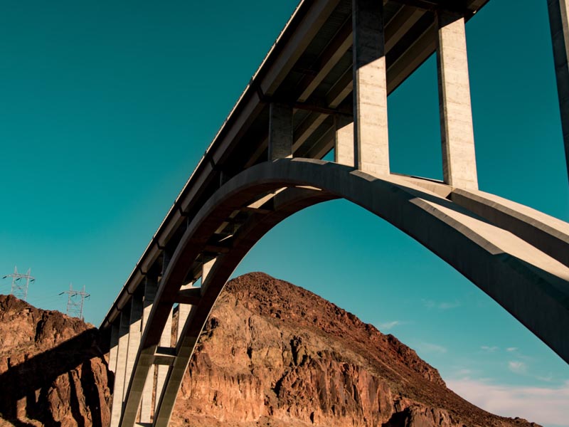 A close up of the Mike O'Callaghan-Pat Tilman Memorial Bridge, as seen from below